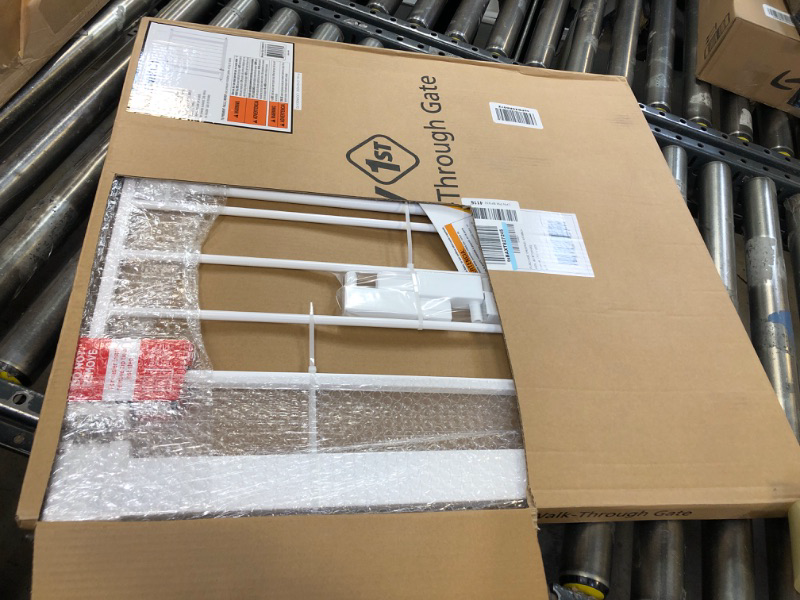 Photo 1 of Safety 1st Easy Install 28" High Walk Thru Gate, Fits Between 29" and 38" 1-Pack Original Size White