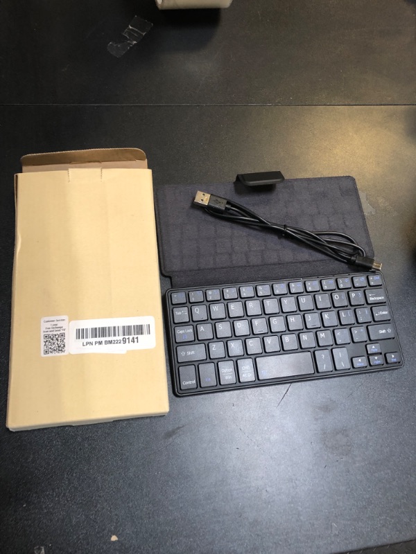 Photo 1 of Universal Wireless Keyboards Ultra Light Portable Mini Keyboard with Adjustable Angle Stand & Leather Case,Computer Keyboards Rechargeable Travel Bluetooth Keyboard for iPad Android,Windows and iOS