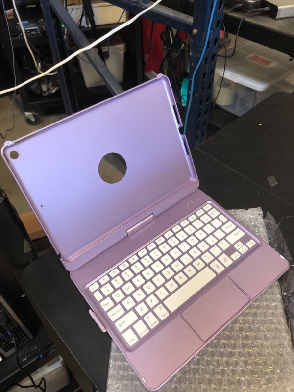 Photo 1 of Touch Keyboard Case for iPad 9th Generation (10.2", 2021), 10 Color Backlight, 360° Slim Cover, Bluetooth Keyboard with Pencil Holder, Compatible with iPad 8th Gen 2020, 7th Gen 2019, Light Purple (MISSING CORD)