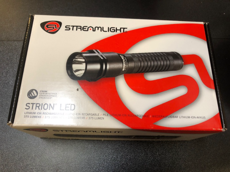 Photo 2 of Streamlight 74302 Strion LED Flashlight with AC/12-Volt DC Charger and 2-Holder, Black