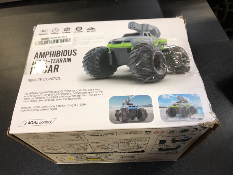 Photo 2 of Amphibious Remote Control Car Boat Water Squirt RC Tank 2.4GHz Gesture Sensor 4WD Monster Truck RC Cars 360°Rotating Waterproof Stunt Car for Age 6 7 8 9-12 Kids Girls Boys Gift Beach Pool Water Toy