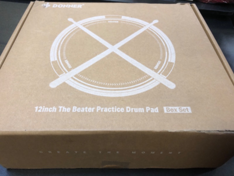 Photo 2 of Donner Drum Practice Pad Stand Kit Snare Drum Stand with 12'' Marching Pad Silent Drum Pad, Drumsticks, Backpack Adjustable Stand Fits 10''-14'' Dia Drums(Black)