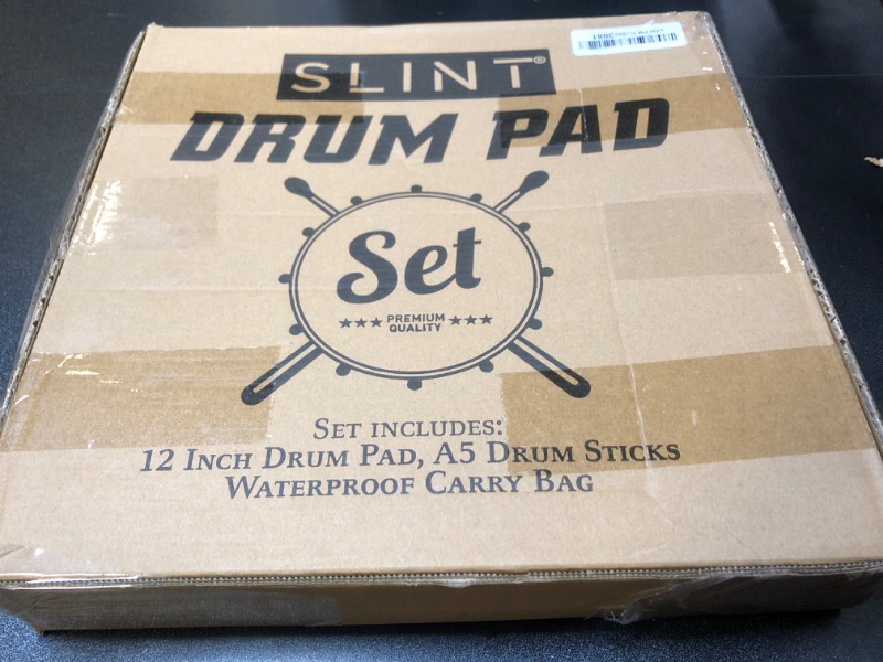 Photo 2 of SLINT Drum Practice Pad, 12" Drum Pad 2 Surfaces - Double-Sided Practice Drum Pad Set, Practice Pad for Drumming - Snare Drum Practice Pad - Drum Pad For Kids (Drum Pad with Sticks)