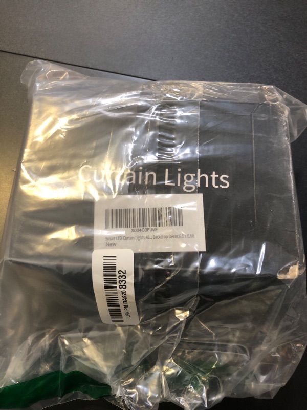 Photo 1 of echosari Smart LED Curtain Lights USB,400 LED Dynamic Pattern DIY Curtain String Lights with App & Remote Music Sync RGB Built in Chip Curtain Light for Bedroom Christmas Backdrop Decor,6.6 x 6.6ft