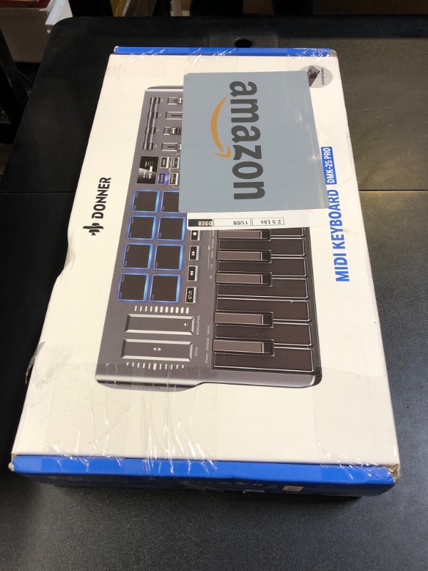 Photo 1 of Donner USB-C MIDI Keyboard Controller, 25 Key Portable Mini MIDI Keyboard with 8 Drum Pads, OLED Display, 16 Smart Scales, Arpeggio, Replay, 4 DAW Software and 40 Teaching Courses, DMK 25 Pro Black