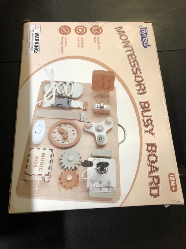 Photo 1 of Joyreal Montessori Busy Board for Toddlers - Wooden Sensory Board Activity Board for Fine Motor Skills, Travel Baby Busy Board Sensory Toys for Kids