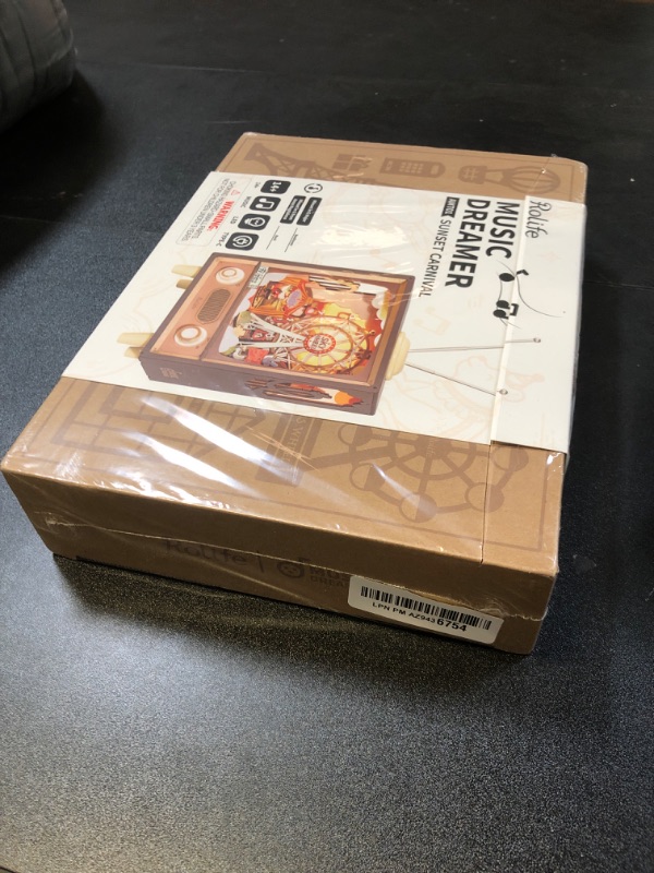 Photo 1 of ROBOTIME Wooden Music Box 3D Wooden Puzzles for Adults Ferris Wheel Music Box Model Building Set DIY Book Nook Kit for Hobby Personalized Crafts Gift (Sunset Carnival)