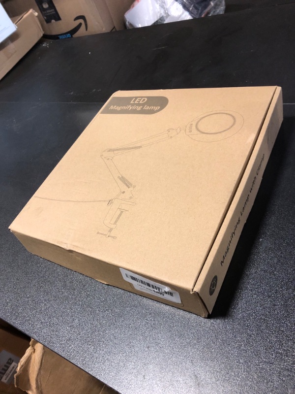 Photo 1 of IVMAIE 10X Magnifying Glass with Light and Clamp, LED Desk Lamp with Swing Arm, 5 Color Modes Dimmable Lighted Magnifier with Stand, Hands Free for Painting Crafts Jewelry Sewing Close Work, White