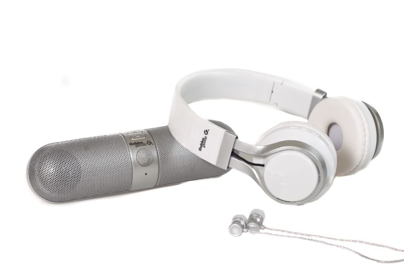 Photo 1 of METALLIX Silver 3 Piece Set 1 Bluetooth Speakers 1 Wireless Headphones & 1 Ear Bud Set With Micro-phone