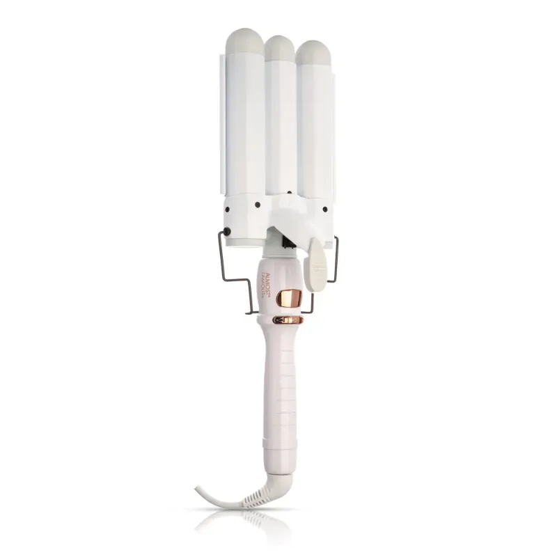 Photo 1 of Wave Away Triple Barrel Curler with Tourmaline Ceramic Barrels 1.25-inch barrels heat up to max temp in just a couple of minutes perfect voluminous beachy waves Japanese Tourmaline 2.4-meter long 360-degree swivel cord 135W Adjustable temperature settings