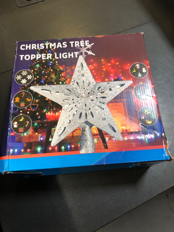Photo 1 of DG-Direct Christmas Tree Topper Lighted Star with 6 Projected Patterns,3D Hollow Sparkling Star Christmas Tree Topper with Rotating Magic Projector for Christmas Tree Ornament