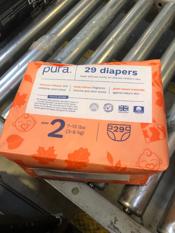 Photo 2 of Pura Size 2 Eco-Friendly Diapers (7-13 lbs) TCF, Hypoallergenic, Soft Organic Cotton Comfort, Sustainable, Wetness Indictor. Allergy UK, Paper Packaging. 1 Pack of 29