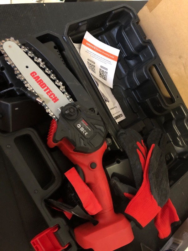 Photo 1 of BEST Mini Chainsaw 6 Inch, Gardtech Cordless Portable Electric Chain Saw Handheld Electric Chainsaws with 2023 Upgraded 4 Chains 2 Batteries Good for Olders, DIYer, Gardeners Continuously 2 Hours Work