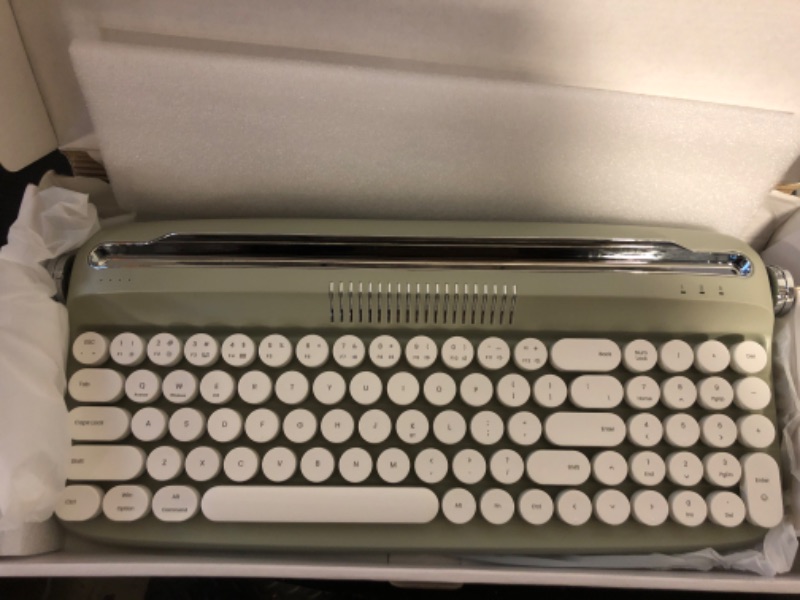 Photo 1 of YUNZII Upgraded Wireless Keyboard, Retro Keyboard Typewriter Style with Integrated Stand, USB-C/Bluetooth Keyboard with Cute Round Keycaps for Multi Device for Win/Mac (B309, Sweet Mint)