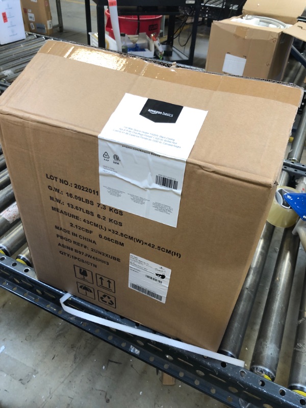 Photo 1 of Amazon Basics Portable Space Heater, With Remote Control, Adjustable Thermostat, LED display, Energy-Saving ECO-Smart Setting, 1500W, Black, 11.4"D x 14.5"W x 14.7"H