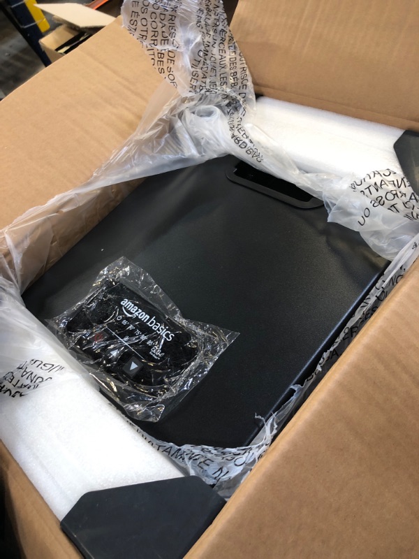 Photo 1 of Amazon Basics Portable Space Heater, With Remote Control, Adjustable Thermostat, LED display, Energy-Saving ECO-Smart Setting, 1500W, Black, 11.4"D x 14.5"W x 14.7"H