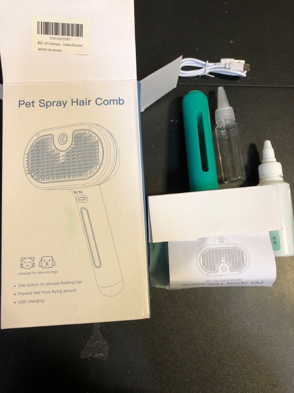 Photo 2 of Cat/Dog Grooming Tool - Hair Removal Brush with Water Tank, Release Button and Steam Feature for Deshedding