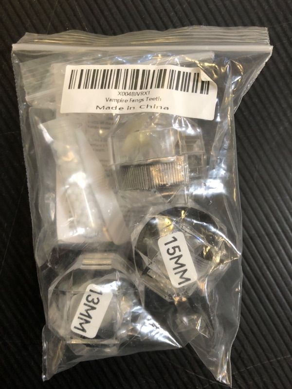 Photo 1 of UOUYOO Vampire Teeth Vampire fangs Vampire fangs fake fangs for Cosplay Party Props Halloween Party Fangs (Vampire Teeth 2)