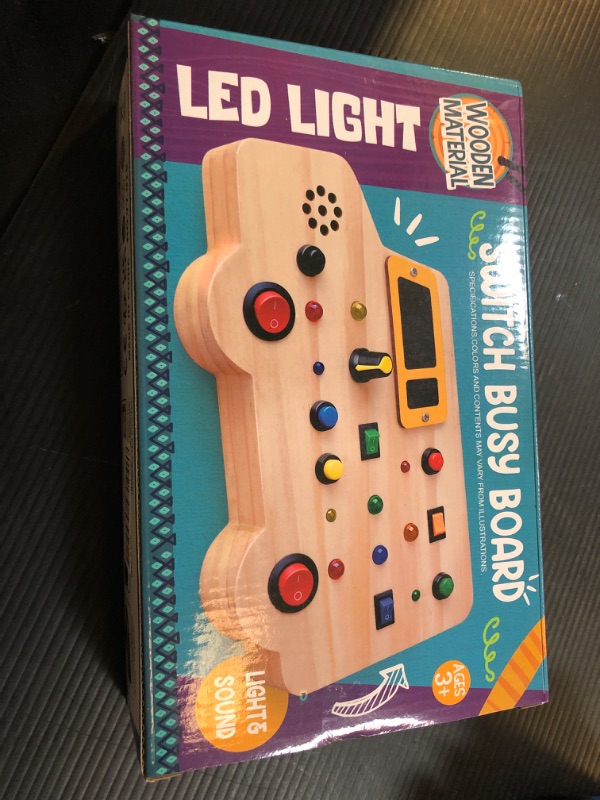 Photo 2 of Bestbase Wooden Toddler Toys Montessori Busy Board, Sensory Toys with Light up LED Sounds Buttons Wooden Car Kids Toys, Montessori Toys for 3+ Year Old Boy/Girl Stocking Stuffers