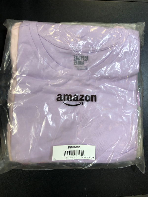 Photo 2 of Amazon Essentials Girls' Short-Sleeve T-Shirt Tops (Previously Spotted Zebra), Pack of 4, Black Unicorn/Grey Text Print/Light Pink/Lilac, X-Large