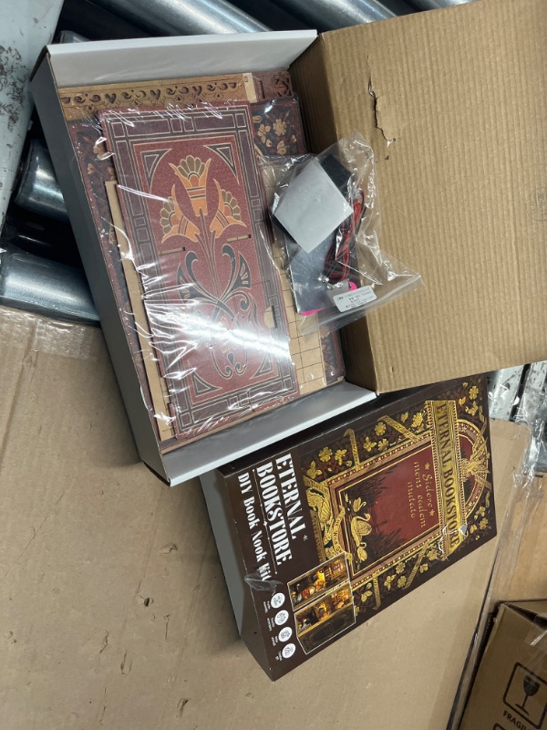 Photo 1 of CUTEBEE Book Nook Kit - DIY Miniature House Dollhouse Kit for Adult and Teens, Booknook Bookshelf Decor Alley Model Build with LED Light, Gifts for Family and Friends