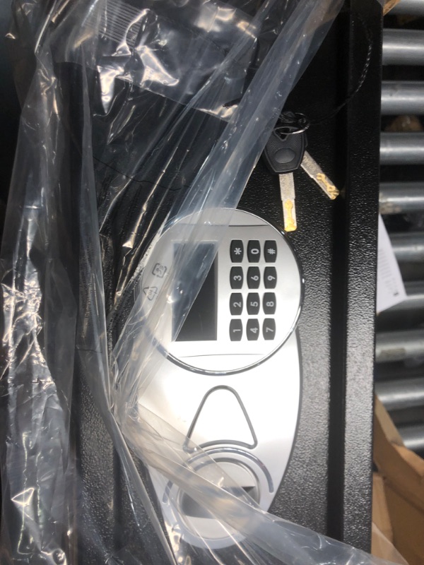 Photo 1 of Amazon Basics Steel Security Safe with Programmable Electronic Keypad Lock - Secure Cash, Jewelry, ID Documents, 0.7 Cubic Feet, Black, 16.93''W x 14.57''D x 7.09''H