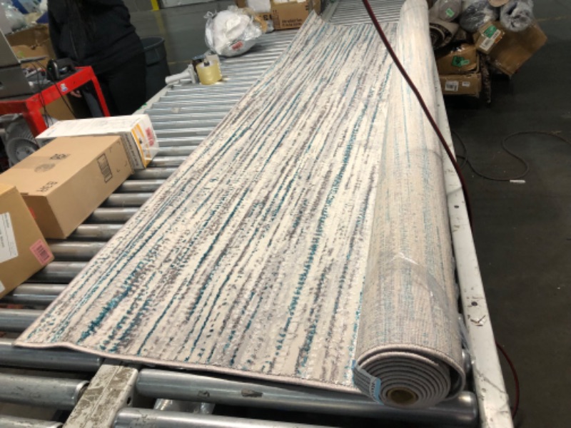 Photo 4 of ***USED - DAMAGED - FRAYED - NO PACKAGING - SEE PICTURES***
JONATHAN Y SOR200B-8 Loom Modern Strie' Indoor Area-Rug Solid Striped Casual Transitional Easy-Cleaning Bedroom Kitchen Living Room Non Shedding, 8 ft x 10 ft, Gray/Turquoise