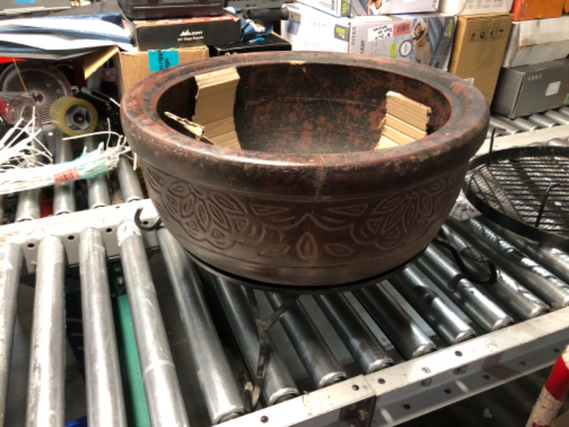 Photo 4 of ***NO PACKAGING - MAJOR DAMAGE - CRACKED - SEE PICTURES***
20 in. Clay Fire Pit with Iron Stand with extra metal grill pieces.