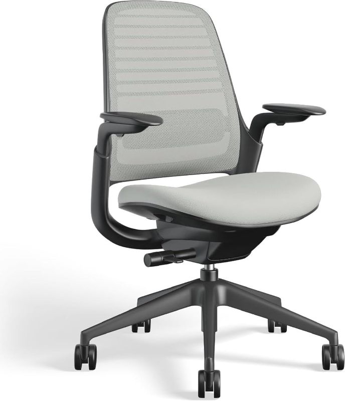 Photo 1 of ***STOCK PHOTO MAY BE INACCURATE FPR REFERENCE ONLY******Steelcase Series 1 Office Chair - Ergonomic Work Chair with Wheels for Carpet - Helps Support Productivity - Weight-Activated Controls, Back Supports & Arm Support - Easy Assembly - Gray

