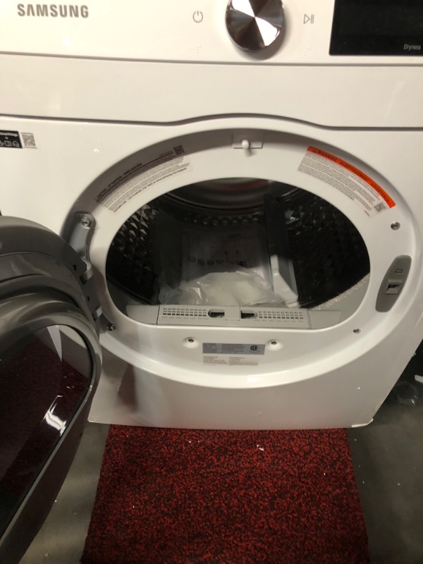 Photo 1 of ***TRUCK/TRAILER PICKUP ONLY - NONREFUNDABLE - FOR PARTS ONLY - MAJOR DAMAGE - SEE COMMENTS***
SAMSUNG 4.0 cu. ft. Electric Dryer, Compact Clothes Drying Machine, Stackable for Small Spaces w/Sensor Dry, 12 Preset Cycles, Reversible Door, Internal Drum Li