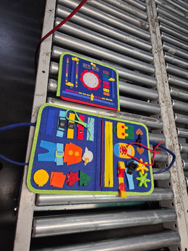 Photo 1 of ***DAMAGED - ZIPPERS BROKEN - OTHER PARTS DAMAGED AS WELL - SEE PICTURES***
Guolely Busy Board Montessori Toy for 1 2 3 4 Year Old Toddlers - Educational Activity Developing Sensory Board for Fine Basic Dress Motor Skills - Travel Toys for Plane Car, Gift