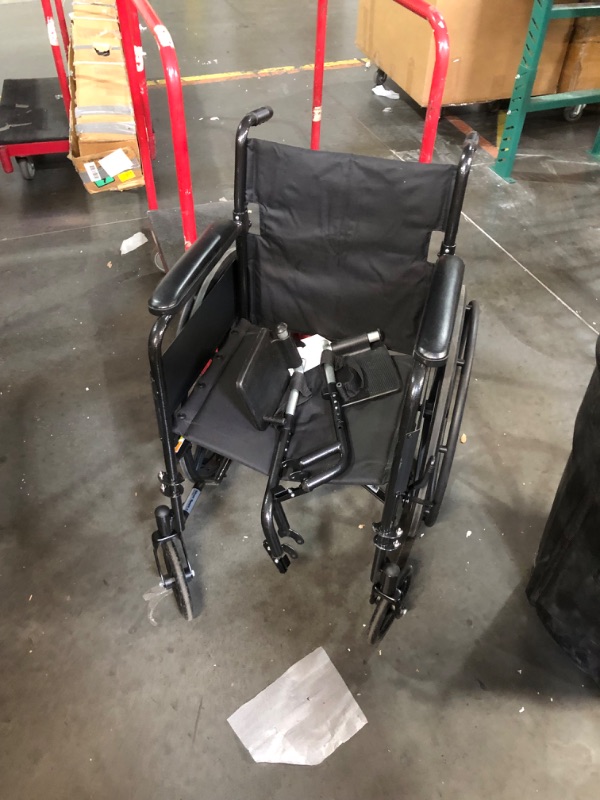Photo 1 of ***NO PACKAGING - USED - SEE PICTURES***
Drive Medical SSP118FA-SF Silver Sport 1 Folding Transport Wheelchair with Full Arms and Removable Swing-Away Footrest, Black
