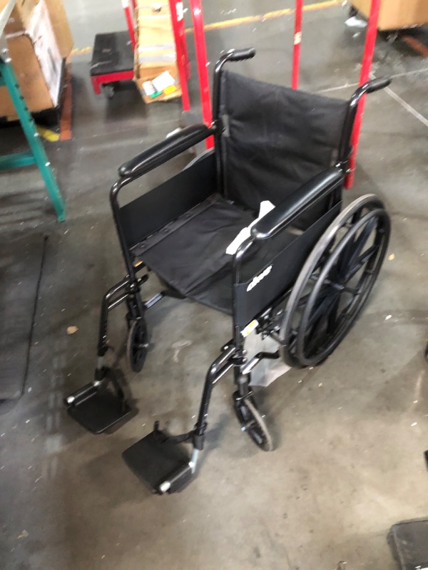 Photo 1 of ***NO PACKAGING - USED - SEE PICTURES***
Drive Medical SSP118FA-SF Silver Sport 1 Folding Transport Wheelchair with Full Arms and Removable Swing-Away Footrest, Black