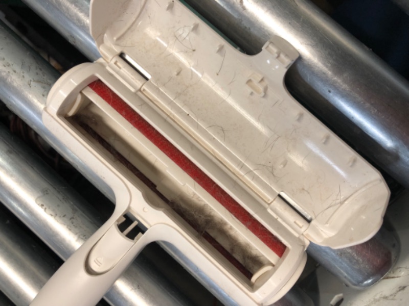 Photo 1 of ***HEAVILY USED AND DIRTY - SEE PICTURES***
Chom Chom Roller Pet Hair Remover and Reusable Lint Roller - ChomChom Cat and Dog Hair Remover for Furniture, Couch, Carpet, Clothing and Bedding - Portable, Multi-Surface Fur Removal Tool
