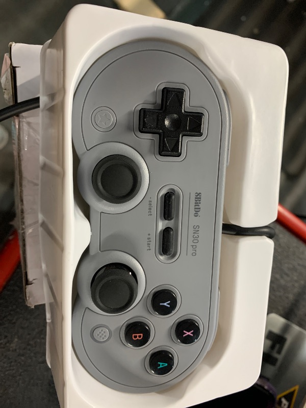 Photo 1 of ***(NO RETURNS OR REFUNDS/ FOR PARTS ONLY/ NON FUNCTIONAL)***
8Bitdo Sn30 Pro USB Wired Gamepad for Switch, Windows & Raspberry Pi(Gray Edition)