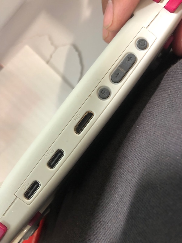 Photo 1 of **MISSING CHARGER**
RG ARC-D Handheld Game Console 4.0" IPS Multi-Touch Screen Android 11 Linux OS RK3566 64bit 5G WiFi Bluetooth 4.2 Retro Video Player with 128GB Card 4541 Games Support Wired Handle(RG ARC-D-Grey)