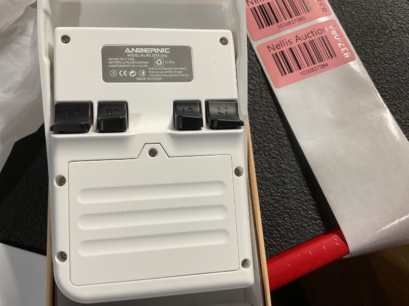 Photo 1 of RG35XX Plus Retro Handheld Game Console 3.5 Inch IPS Screen Linux System Video Player Built-in 64G TF Card 5000 Games Support HD-M-I TV Output 5G WiFi Bluetooth 4.2 White