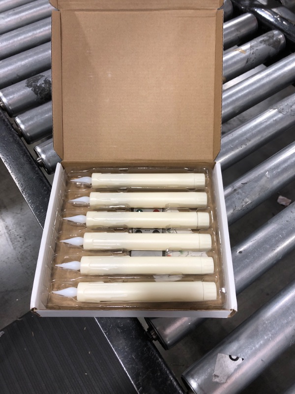 Photo 1 of FPOO Flameless Window Candles Battery Operated with Timer, 7'' Ivory Taper Candles with Remote, Long-Lasting LED Candlestick Fake Candle for Halloween Wedding Christmas Window deocr (Pack of 6)