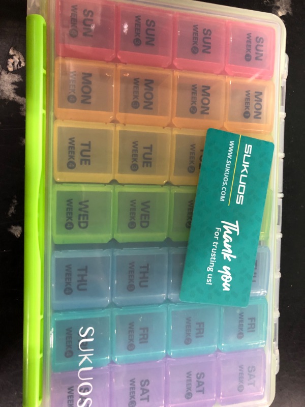 Photo 2 of Sukuos Monthly Pill Organizer 28 Day Case, Moisture-Resistant Large 4 Week Month Pill Cases with Dust-proof Box for Pills/Vitamin/Fish Oil/Supplements