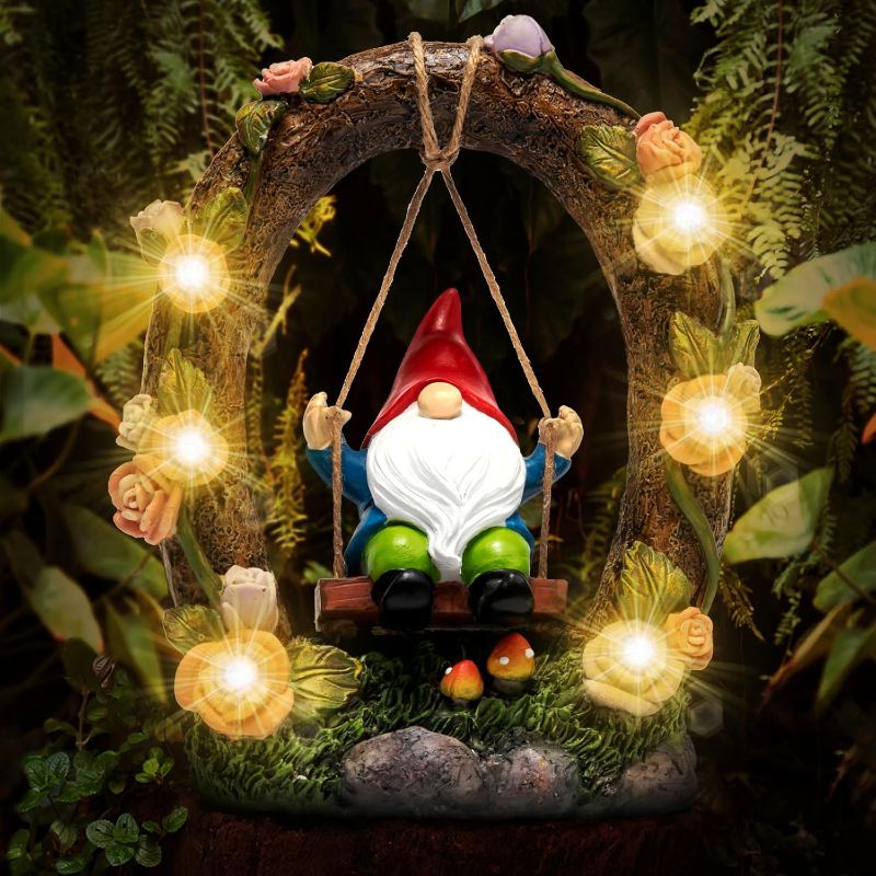 Photo 2 of BHOOO Solar Garden Statue for Outdoor Decor: Gnome Swinging Under Arched Fairy Tree with Fairy Rose Lights - Funny Figurine Ornaments Decorations for Patio Yard Lawn Ideal Gifts for Women & Mom