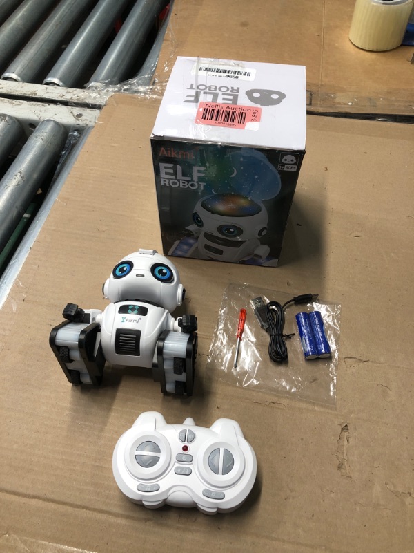 Photo 2 of Aikmi Robot Toys for Kids 5-7, Rechargeable Remote Control Robot with Projector Night Light for Kids, Gesture Sensor, Music, Toys for 6 Year Old Boys Girls Birthday Present Boy Toy (White)