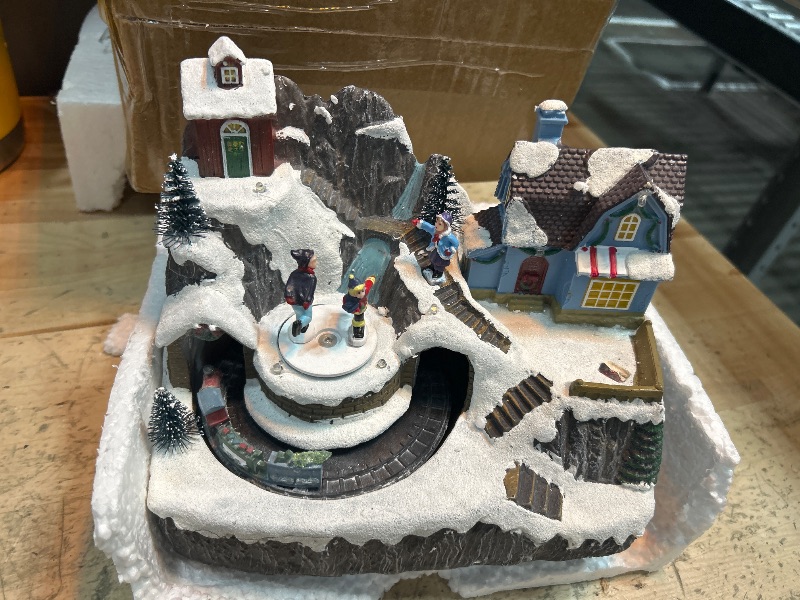 Photo 2 of **MISSING POWER CORD , MAY BE USED WITH BATTERIES( DOUBLE AA'S) 
Valery Madelyn Christmas Village Scene with LED Lights and Train, Battery Operated Musical Resin House Gift for Christmas Home Indoor Decorations,Santa Claus and Winter Wonderland Cottage, 8