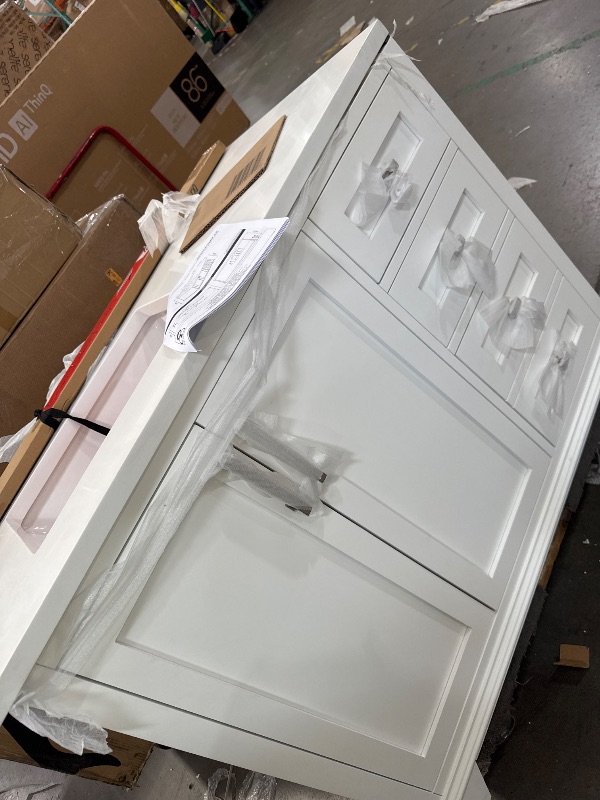 Photo 1 of *UNKNOWN SIZING** WHITE SINK CABINET WITH 6 DOORS 