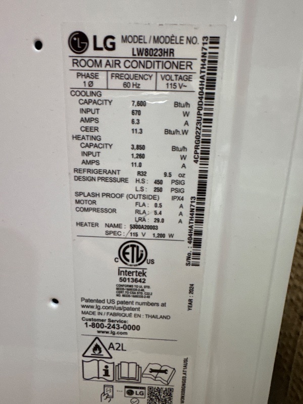 Photo 2 of *POWERS ON** LG Electronics 7600 BTU 115V Window-Mounted Air Conditioner with 3850 BTU Supplemental Heat Function