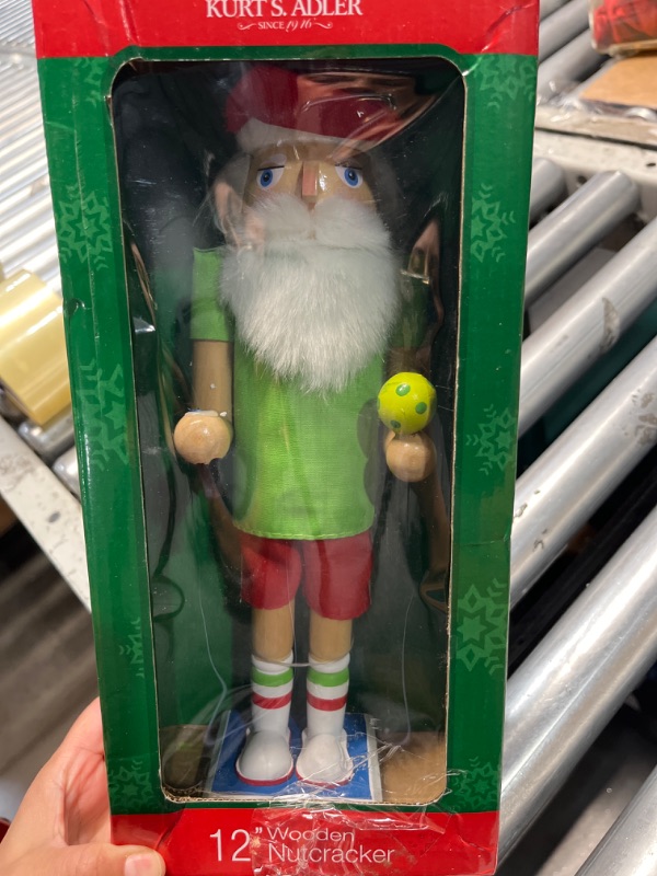 Photo 2 of (FAIR) Kurt Adler 12-inch Wooden Pickleball Nutcracker (Pickle ball pattle broken off) 