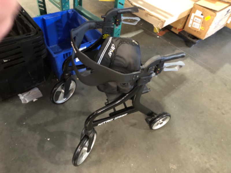 Photo 2 of ***USED - NO PACKAGING - SEE PICTURES***
Drive Medical Nitro Sprint Foldable Rollator Walker with Seat, Petite Height Lightweight Rollator with Large Wheels, Folding Rollator, Short Rolling Walker for Seniors and Adults, Black