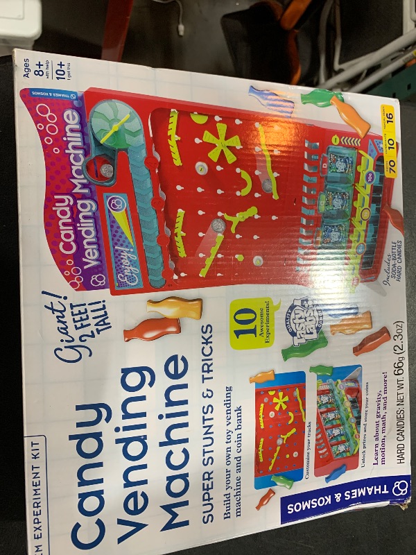 Photo 1 of Thames & Kosmos 2-ft Tall Candy Vending Machine STEM Kit | Build Toy Vending Machine with 10 Gravity & Motion Experiments | Coin Sorting Bank | Math & Engineering Lessons