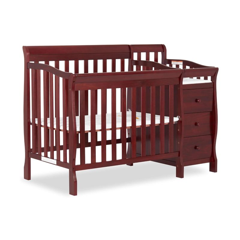 Photo 1 of Dream On Me Jayden 4-in-1 Mini Convertible Crib And Changer in Cherry, Greenguard Gold Certified, Non-Toxic Finish, New Zealand Pinewood, 1" Mattress Pad
