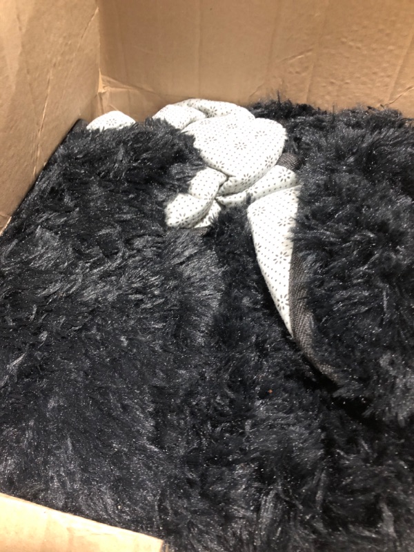Photo 1 of ISEAU Black Rug Super Soft Shaggy 4x6 Feet Rugs for Bedroom, Fluffy Area Rug for Living Room Floor Rug, Fuzzy and Comfy Carpet Nursery Shag Rug for Kids Boys Room Decor 4ft x 6ft Black