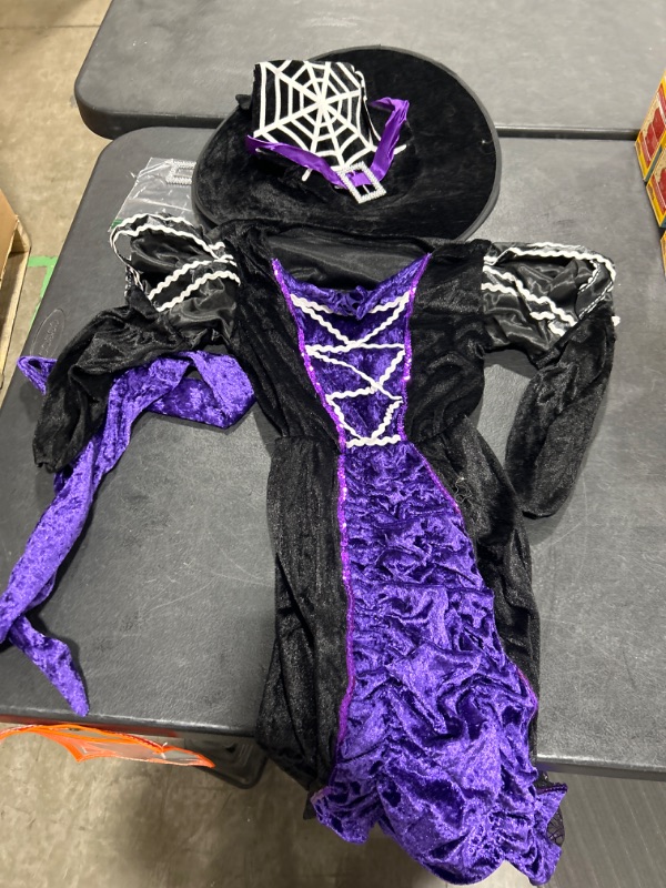 Photo 1 of PURPLE WITCH HALLOWEEN COSTUME 6-8Y 